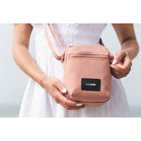 Женская сумка антивор Pacsafe GO Micro Crossbody 4 ст. защиты 1.5л Розовый (35130340)