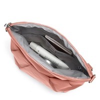 Женская сумка антивор Pacsafe Citysafe CX Convertible Crossbody 5L 6 ст. защиты Розовая (20405340)